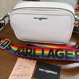 NEW- Karl Lagerfeld white Crossbody Bag with Rainbow Strap. Iconic name on front